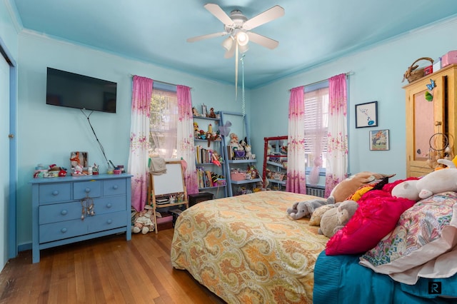 37 Centre St, New York City, NY 10464 - bedroom with multiple windows, hardwood / wood-style flooring, crown molding, and a ceiling fan
