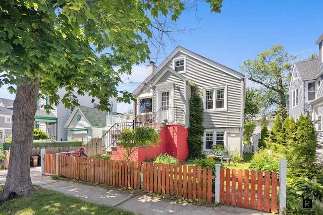 37 Centre St, New York City, NY 10464 - bungalow-style house featuring a fenced front yard and a chimney