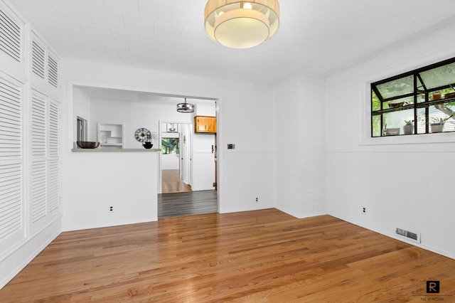 25 Bay St, New York City, NY 10464 - unfurnished room featuring light wood-type flooring