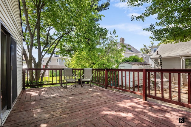 25 Bay St, New York City, NY 10464 - wooden terrace featuring a residential view and a storage unit