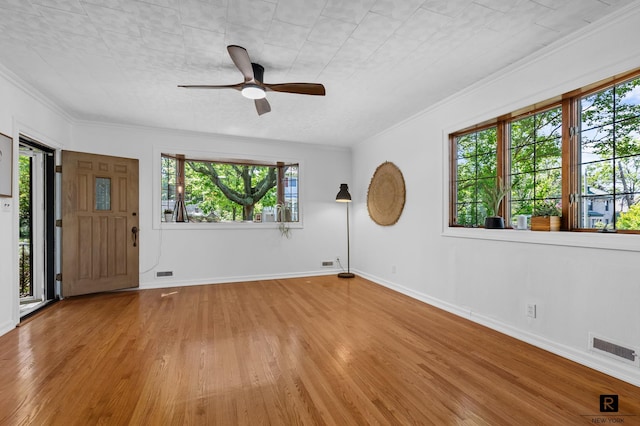 25 Bay St, New York City, NY 10464 - entryway with wood finished floors, ceiling fan, and crown molding