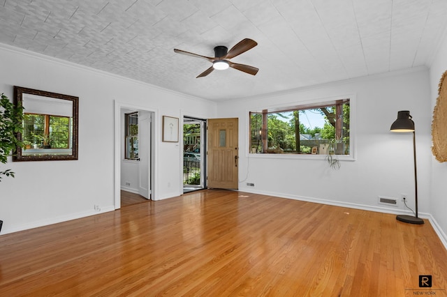 25 Bay St, New York City, NY 10464 - unfurnished room featuring a ceiling fan, light wood-style floors, and ornamental molding