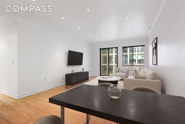 136-140 W 23rd St Unit 4Cc, New York City, NY 10011 - living room featuring light wood-style flooring, recessed lighting, crown molding, and baseboards