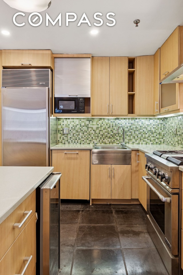 136-140 W 23rd St Unit 4Cc, New York City, NY 10011 - kitchen with built in appliances, open shelves, a sink, beverage cooler, and light countertops