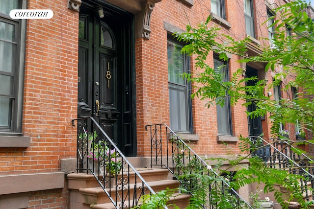 181 Waverly Ave, New York City, NY 11205 - doorway to property featuring brick siding
