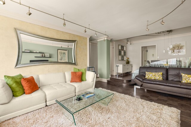 10 W 66th St Unit 30G, New York City, NY 10023 - living area with wood finished floors, track lighting, and baseboards