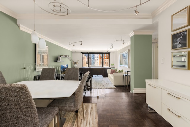 10 W 66th St Unit 30G, New York City, NY 10023 - dining room with crown molding, baseboards, and track lighting