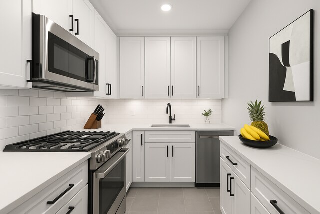 10 W 66th St Unit 30G, New York City, NY 10023 - kitchen with appliances with stainless steel finishes, light countertops, light tile patterned floors, white cabinets, and decorative backsplash
