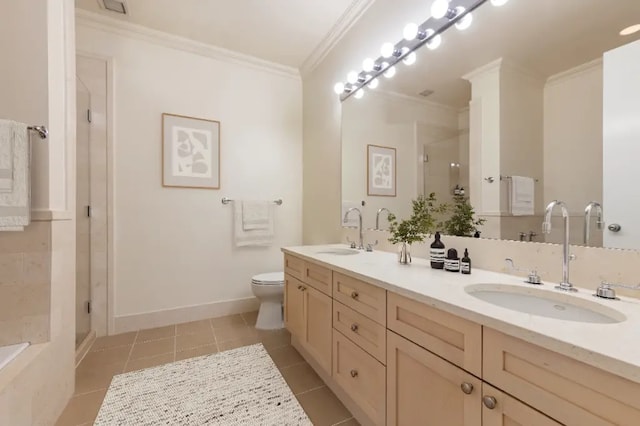 252 7th Ave Unit 5T, New York City, NY 10001 - full bathroom featuring ornamental molding, double vanity, a shower stall, tile patterned flooring, and toilet
