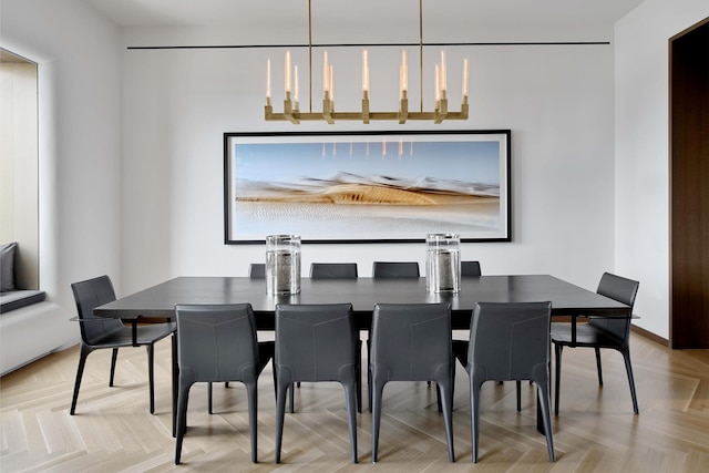 551 W 21st St Unit 16-B, New York City, NY 10011 - dining room featuring a chandelier