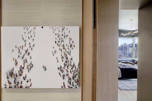 551 W 21st St Unit 16-B, New York City, NY 10011 - detailed view of wood finished floors and ceiling fan