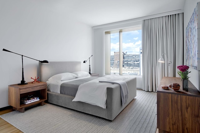 551 W 21st St Unit 16-B, New York City, NY 10011 - bedroom featuring light wood-style floors