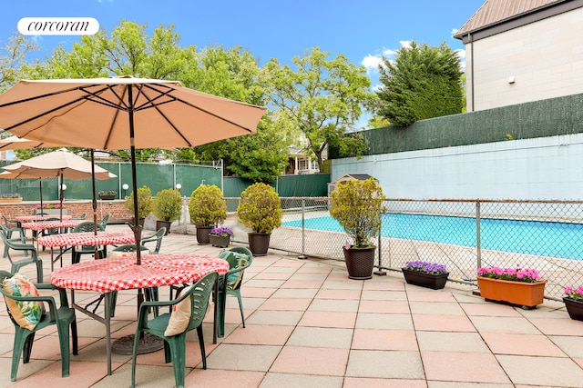 8301 Ridge Blvd Unit 1H, New York City, NY 11209 - view of patio featuring outdoor dining area