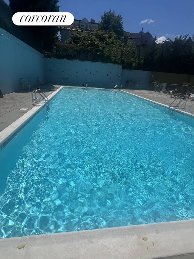 8301 Ridge Blvd Unit 1H, New York City, NY 11209 - community pool with a patio