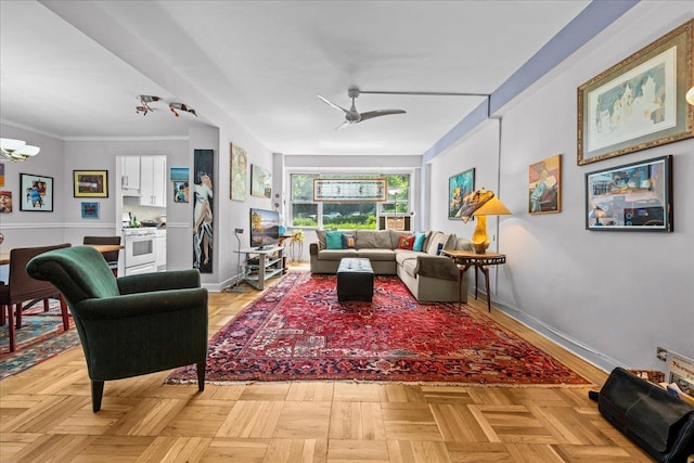 750 Kappock St Unit 1A, New York City, NY 10463 - living room with baseboards, a chandelier, and a ceiling fan