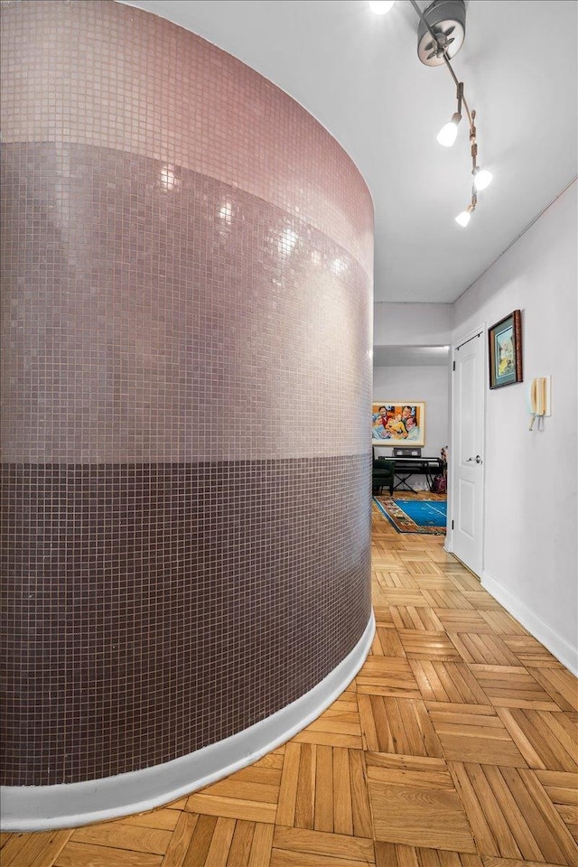 750 Kappock St Unit 1A, New York City, NY 10463 - corridor with baseboards and track lighting