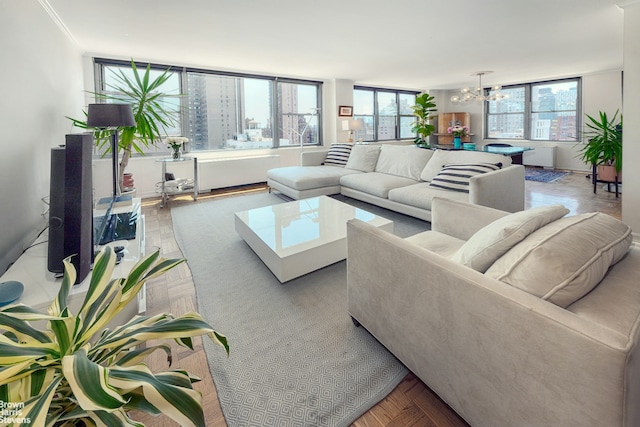 500 E 83rd St Unit 16M, New York City, NY 10028 - living room with a chandelier and baseboards