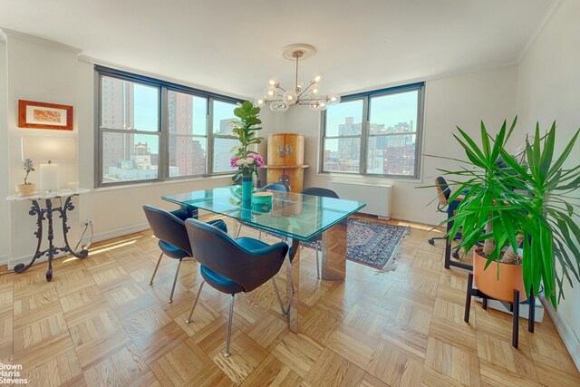 500 E 83rd St Unit 16M, New York City, NY 10028 - dining area featuring ornamental molding, a chandelier, radiator, and a city view