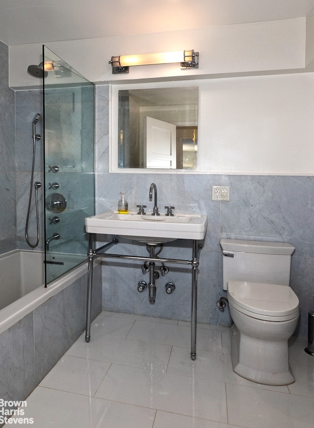 500 E 83rd St Unit 16M, New York City, NY 10028 - full bathroom featuring tiled shower / bath and tile walls
