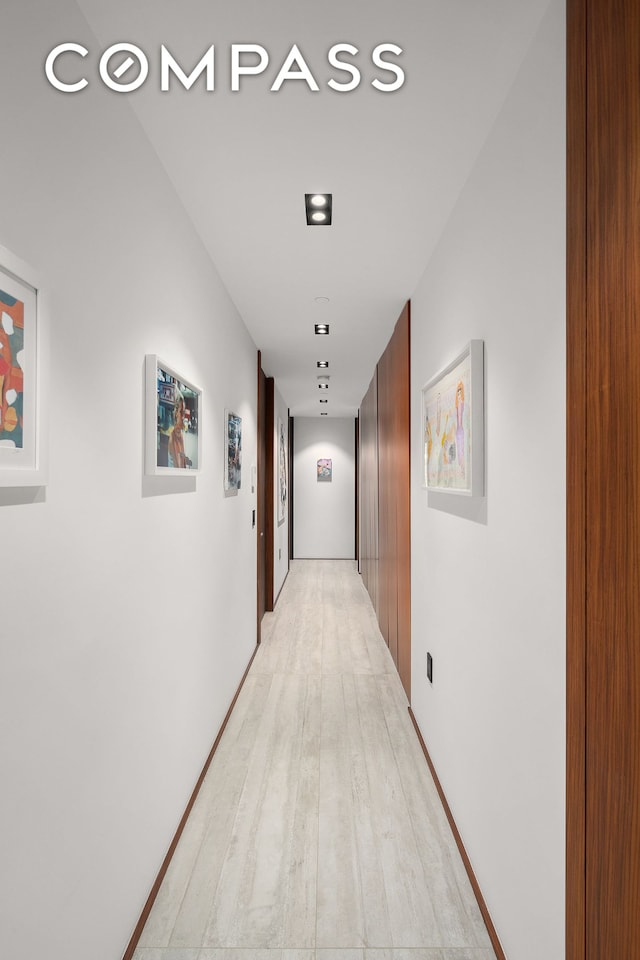 619 E 6th St Unit 4, New York City, NY 10009 - hallway featuring light wood-type flooring
