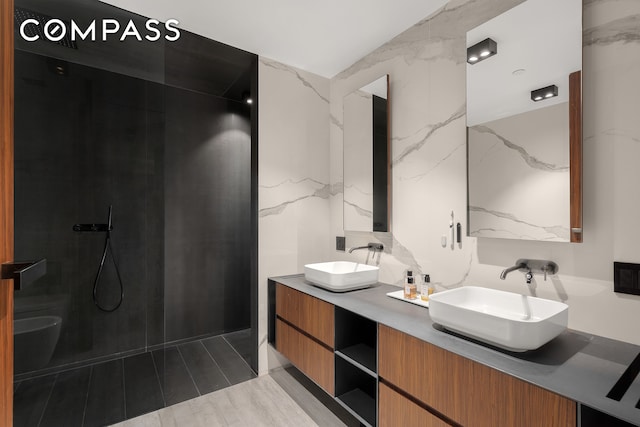 619 E 6th St Unit 4, New York City, NY 10009 - full bath featuring double vanity, wood finished floors, and a marble finish shower