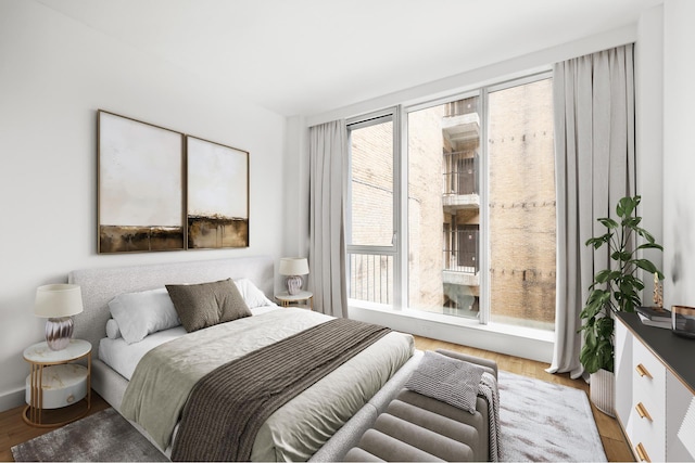 241 5th Ave Unit 5C, New York City, NY 10016 - bedroom featuring wood finished floors