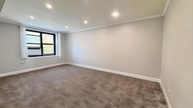 90-09 Northern Blvd Unit 504, New York City, NY 11372 - unfurnished room featuring dark colored carpet, crown molding, baseboards, and recessed lighting