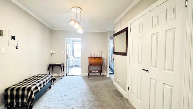 90-09 Northern Blvd Unit 504, New York City, NY 11372 - foyer featuring carpet flooring, crown molding, radiator, and baseboards