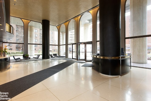 60 E 8th St Unit 12N, New York City, NY 10003 - common area featuring floor to ceiling windows