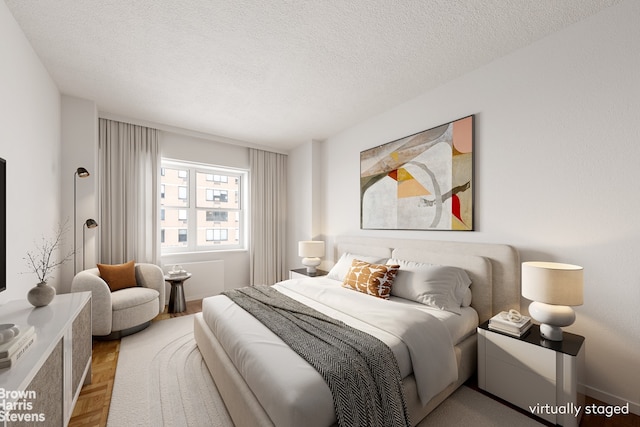 60 E 8th St Unit 12N, New York City, NY 10003 - bedroom featuring a textured ceiling
