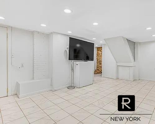 233 E 31st St Unit A, New York City, NY 10016 - basement with recessed lighting and light tile patterned floors