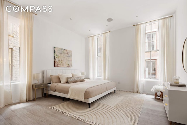 63 Greene St Unit 2D, New York City, NY 10012 - bedroom with wood finished floors and baseboards