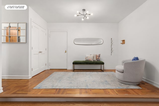 301 E 48th St Unit 6G, New York City, NY 10017 - foyer entrance with a chandelier and baseboards