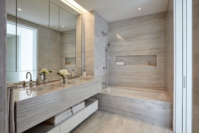 200 E 59th St Unit 26D, New York City, NY 10022 - full bathroom featuring double vanity and a combined bath / shower with marble appearance