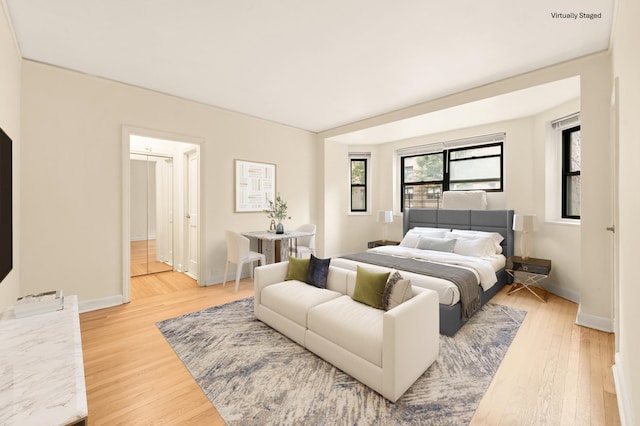 34-21 78th St Unit 1-H, New York City, NY 11372 - bedroom featuring light wood finished floors