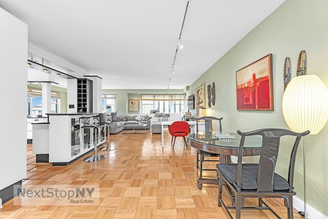 1175 York Ave Unit 16J, New York City, NY 10065 - dining room featuring rail lighting