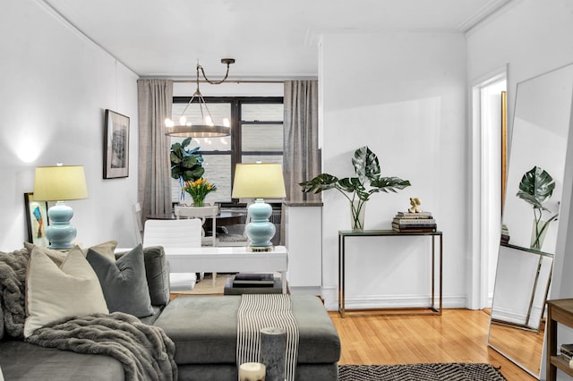 222 E 35th St Unit 1-E, New York City, NY 10016 - living area with wood finished floors, a chandelier, and crown molding