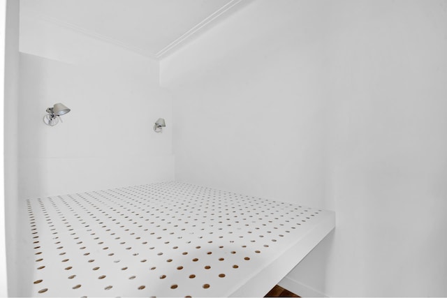 253 W 16th St Unit 6D, New York City, NY 10011 - bathroom view of a tile shower and crown molding