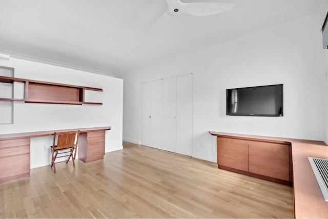 253 W 16th St Unit 6D, New York City, NY 10011 - unfurnished living room with light wood-style floors and ceiling fan