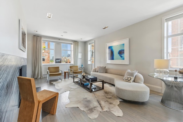 465 W 23rd St Unit 19D, New York City, NY 10011 - living area with baseboards, wood finished floors, and recessed lighting