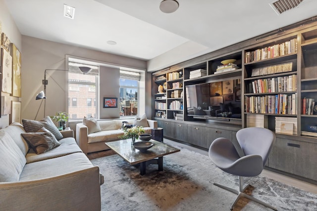 465 W 23rd St Unit 19D, New York City, NY 10011 - living room with built in shelves