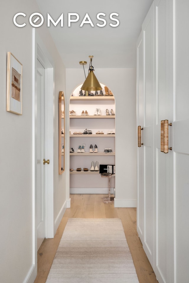 135 E 83rd St Unit 8/9C, New York City, NY 10028 - corridor with light wood-type flooring and baseboards