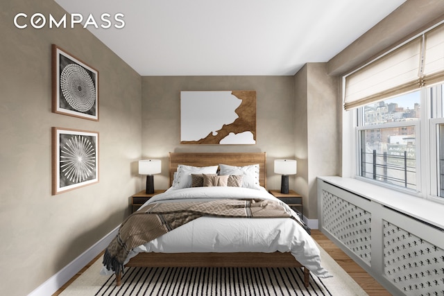 135 E 83rd St Unit 8/9C, New York City, NY 10028 - bedroom with wood finished floors and baseboards