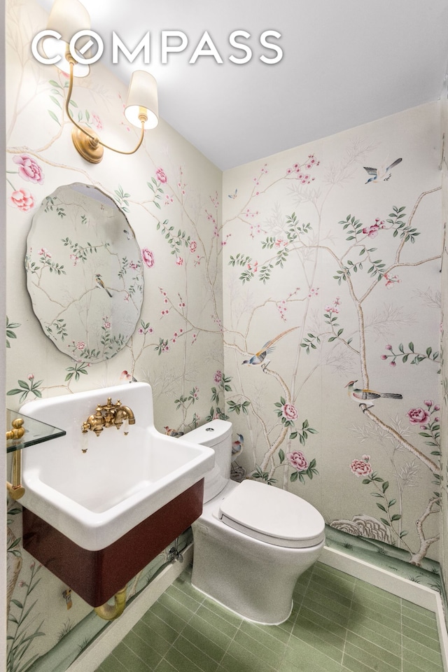 135 E 83rd St Unit 8/9C, New York City, NY 10028 - bathroom featuring toilet and a sink