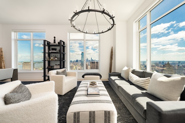 30 Park Pl Unit 60B, New York City, NY 10007 - living room featuring a chandelier, baseboards, and a view of city