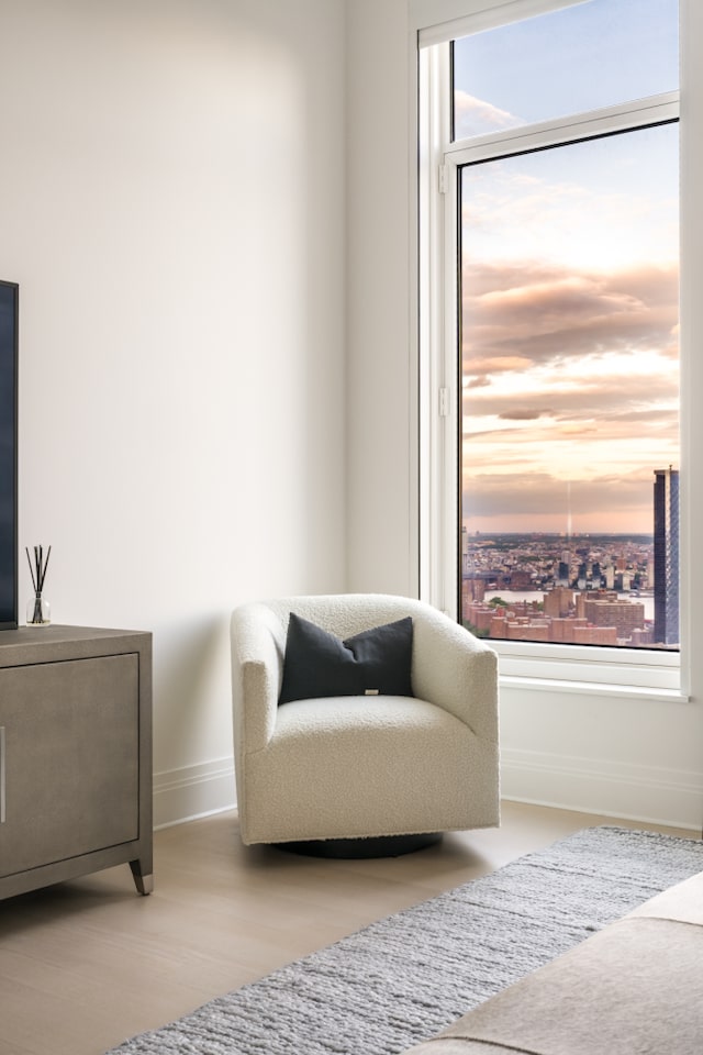 30 Park Pl Unit 60B, New York City, NY 10007 - sitting room featuring baseboards and wood finished floors