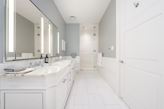 30 Park Pl Unit 60B, New York City, NY 10007 - full bathroom featuring a stall shower and double vanity