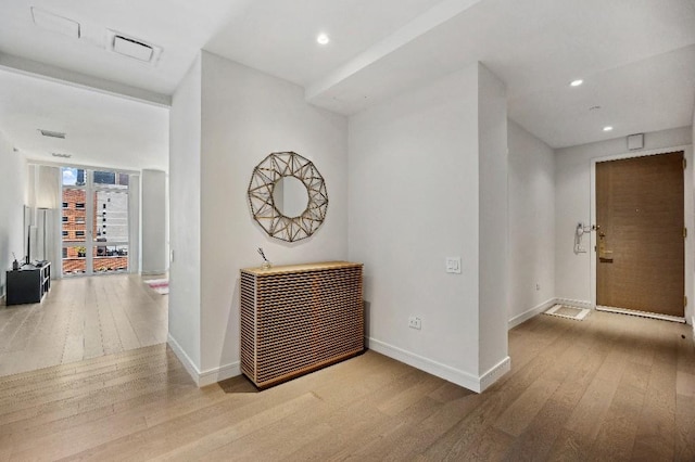 305 E 51st St Unit 20-B, New York City, NY 10022 - hall with hardwood / wood-style floors and recessed lighting