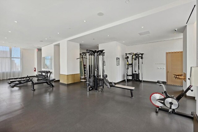 305 E 51st St Unit 20-B, New York City, NY 10022 - gym featuring recessed lighting