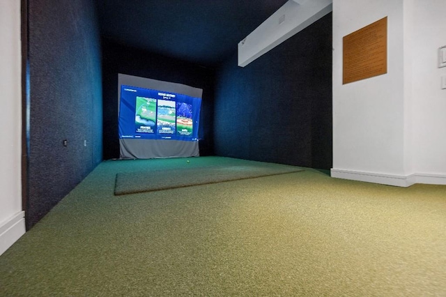 305 E 51st St Unit 20-B, New York City, NY 10022 - empty room featuring golf simulator and carpet